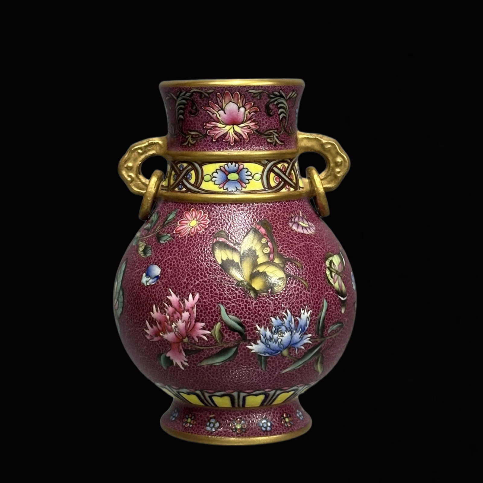 An Exquisite Enamel Painted Gold Flower and Butterfly Pattern Double-Ears Vase: An Exquisite Enamel Painted Gold Flower and Butterfly Pattern Double-Ears Vase,Qing Dynasty,China,Qianlong Four-Character Mark,Size:5.7inx3.9in 珐琅彩描金花卉