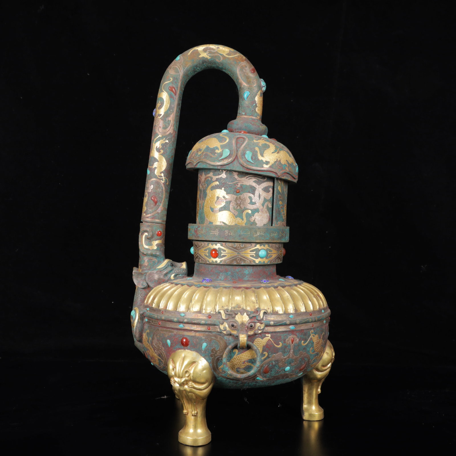 An Archaic Bronze Inlaid Gold and Silver Dragon and Phoenix Pattern Tripod Censer,Inlaid Gems: An Archaic Bronze Inlaid Gold and Silver Dragon and Phoenix Pattern Tripod Censer,Inlaid Gems,The Warring States period in China,With Mark,Size:9.1inx17.7in,Weight:7700g 铜错金໥