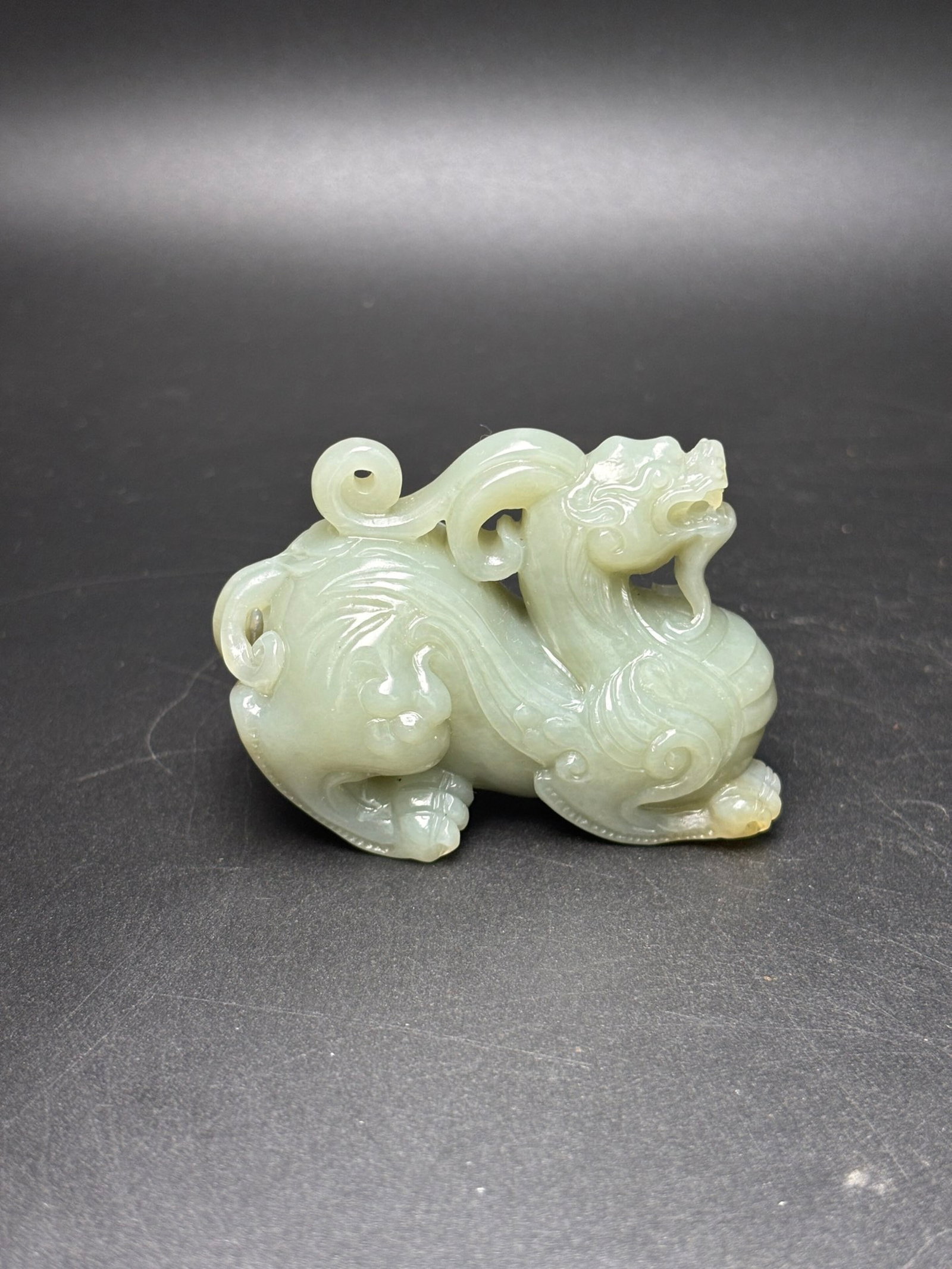 An Exquisite White Jade Beast Ornament: An Exquisite White Jade Beast Ornament,Qing Dynasty,China,Size:64mmx44mmx30mm,Weight:106g 白玉兽摆件,中国清代
