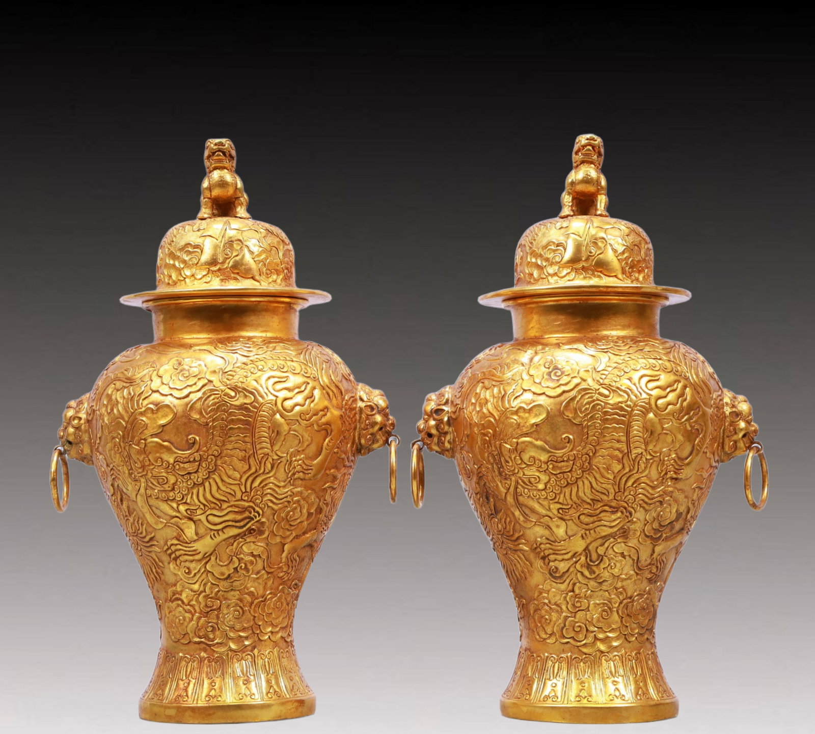 A Pair of Rare Gilt Bronze Auspicious Cloud and Dragon Pattern Lion-Ears Cover Jars: A Pair of Rare Gilt Bronze Auspicious Cloud and Dragon Pattern Lion-Ears Cover Jars,Qing Dynasty, China,Qianlong Four-character Mark,Size:6.3inx4.7inx10.2in,Weight:3950g 一对铜ແ