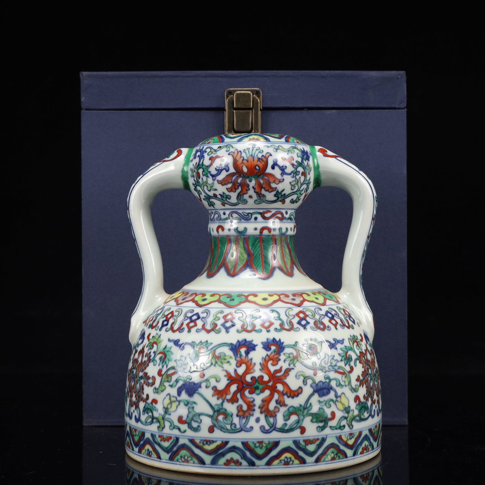 An Exquisite Famille-Rose Lotus Pattern Double-Ears Vase: An Exquisite Famille-Rose Lotus Pattern Double-Ears Vase,Qing Dynasty, China,Yongzheng Six-character Mark,Size:6.1inx6.1inx7.9in 粉彩缠枝莲纹双耳瓶