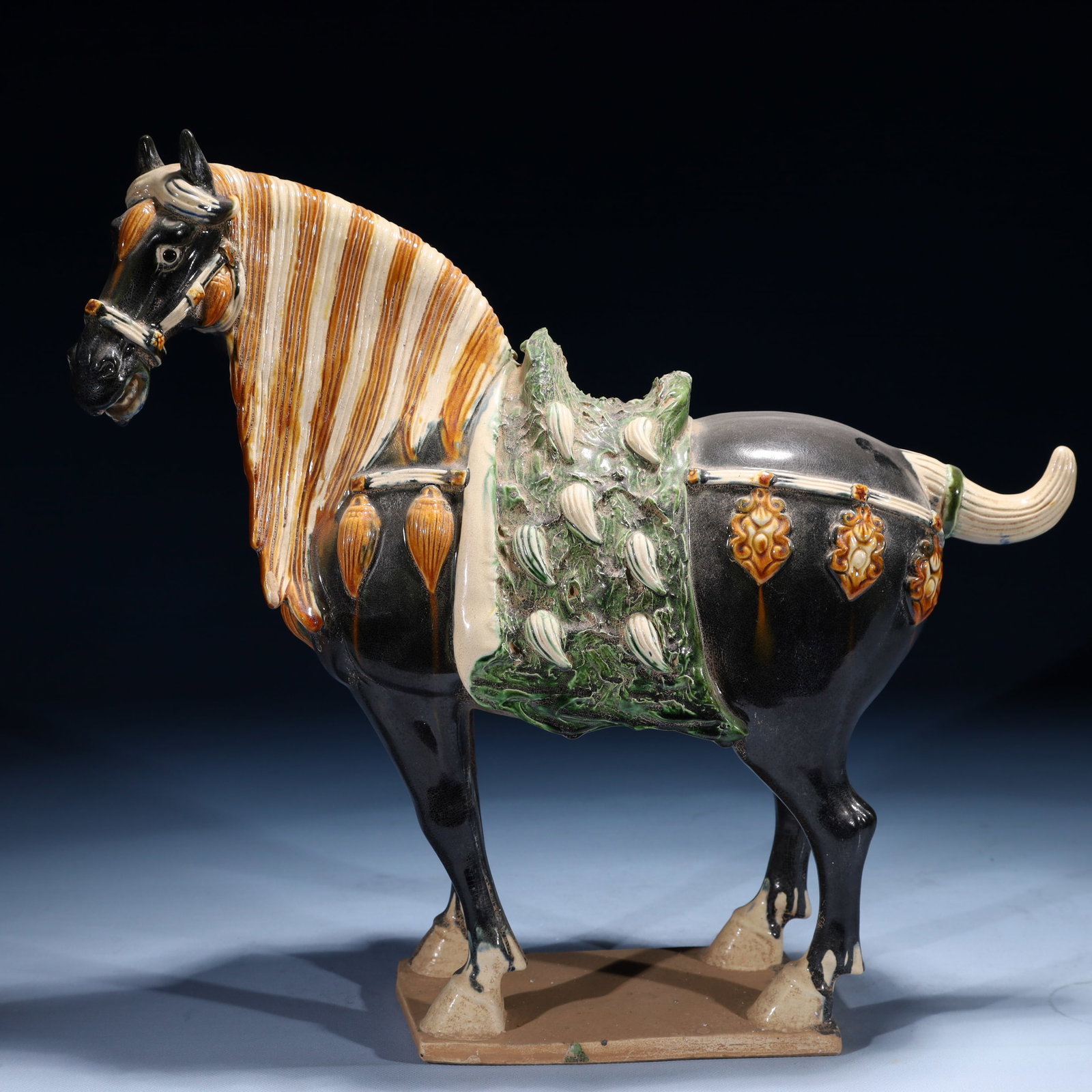 A Rare Tang Tri-Color Glazed Pottery Horse Ornaments: A Rare Tang Tri-Color Glazed Pottery Horse Ornaments,Tang Dynasty,China,Size:16.9inx4.3inx16.5in,Weight:7560g 唐三彩骏马摆件,中国唐代