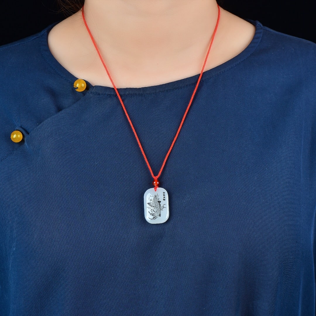 An Exquisite White Jade Fish Pattern Pendant: An Exquisite White Jade Fish Pattern Pendant,Size:30mmx20mm 白玉鱼纹挂件