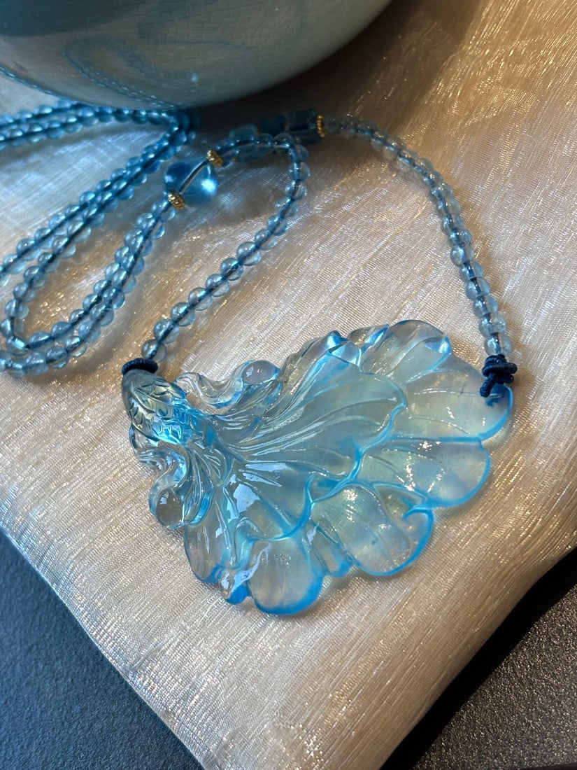 An Exquisite Aquamarine Fish Necklace: An Exquisite Aquamarine Fish Necklace,Size:60.5mmx41mmx10mm,Weight:33.1g 海蓝宝鱼项链