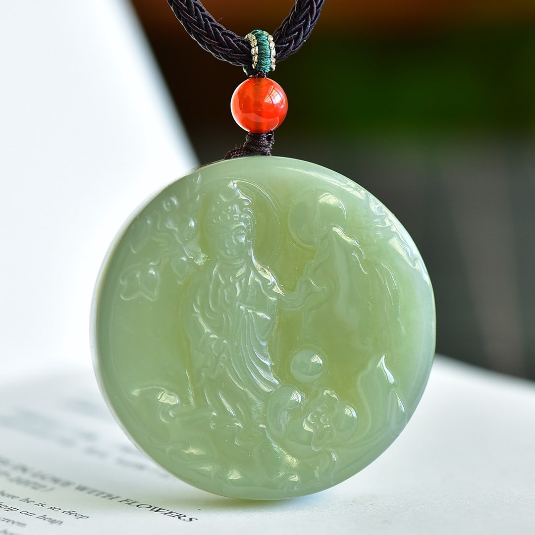 An Exquisite Greenish Jade Statue of Avalokitesvara Pendant: An Exquisite Greenish Jade Statue of Avalokitesvara Pendant,Size:50mmx50mm 青玉观音像挂件