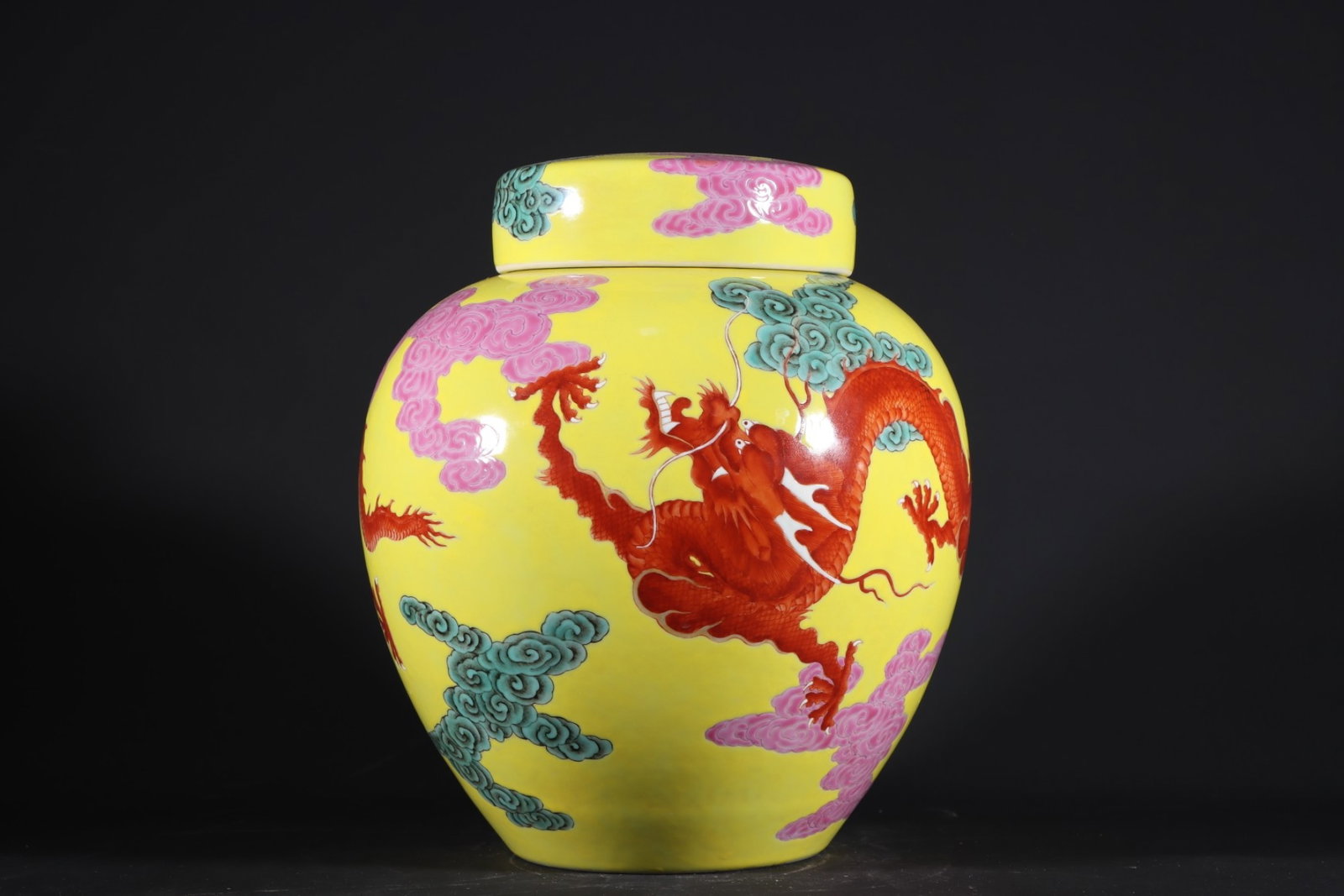 An Exquisite Yellow Ground Famille-Rose Auspicious Cloud and Dragon Pattern Jar with Cover: An Exquisite Yellow Ground Famille-Rose Auspicious Cloud and Dragon Pattern Jar with Cover,Qing Dynasty,China,Yongzheng Six-Character Mark,Size:8.9inx7.9in 黄地粉彩祥