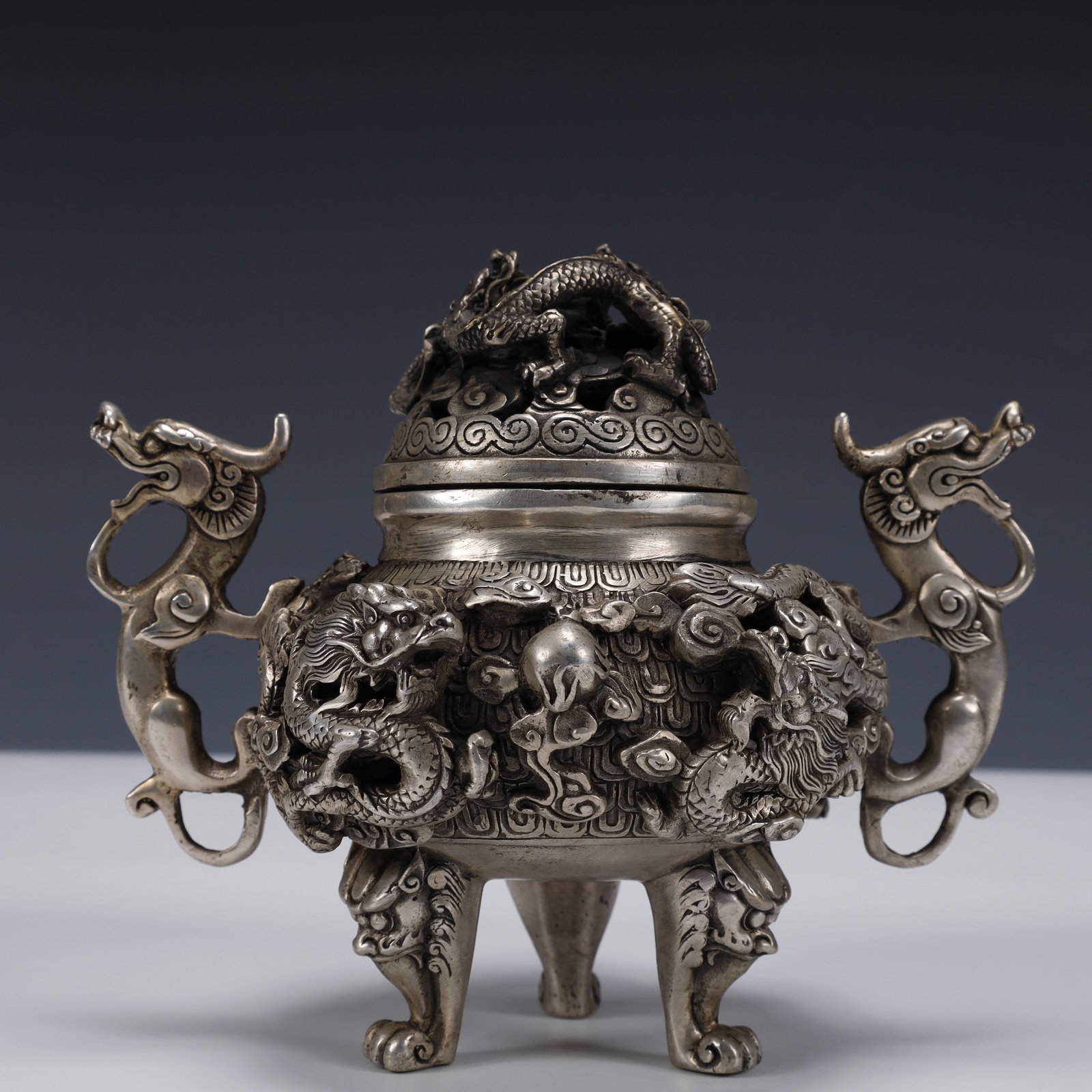 An Exquisite Silver-Plated Bronze Dragon Pattern Double-Ears and Tripod Censer: An Exquisite Silver-Plated Bronze Dragon Pattern Double-Ears and Tripod Censer ,Ming Dynasty, China,Xuande Six-character Mark,Size:7.1inx5.1inx6.3in,Weight:1250g 铜镀银龙ಬ