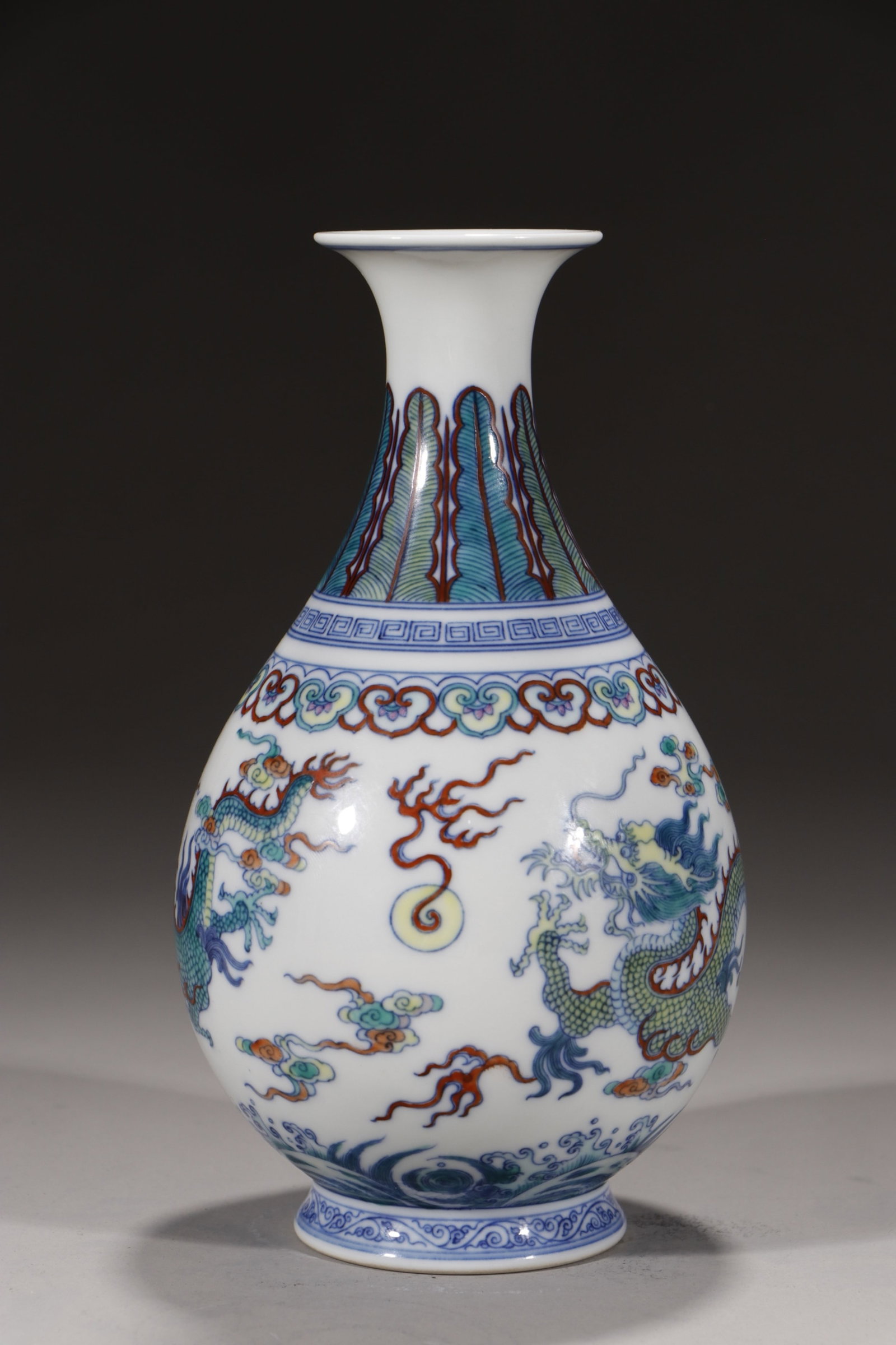 An Exquisite Doucai Auspicious Cloud and Dragon Pattern Vase: An Exquisite Doucai Auspicious Cloud and Dragon Pattern Vase,Qing Dynasty,China,Yongzheng Six-character Mark,Size:7.7in 斗彩祥云龙纹瓶,中国清