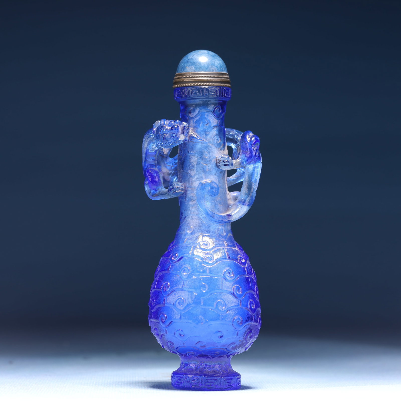 An Exquisite Glass Chi-Dragon Pattern Snuff Bottle: An Exquisite Glass Chi-Dragon Pattern Snuff Bottle,Qing Dynasty,China,Size:2inx4.7in,Weight:152g 琉璃螭龙纹鼻烟壶,中国清代