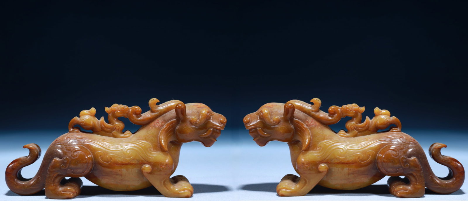 A Pair of Exquisite Archaic Jade Tiger Ornaments: A Pair of Exquisite Archaic Jade Tiger Ornaments,Ancient Time,China,Size:6.7inx1.8inx2.8in,Weight:700g 一对高古玉虎摆件,中国远古