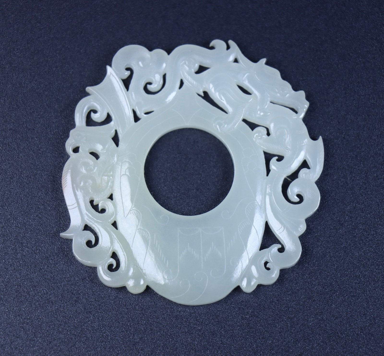 An Exquisite White Jade Chi-Dragon Pattern Pendant: An Exquisite White Jade Chi-Dragon Pattern Pendant,Qing Dynasty,China,Size:2.4inx2.4inx0.2in,Weight:28g 白玉螭龙纹挂件,中国清代