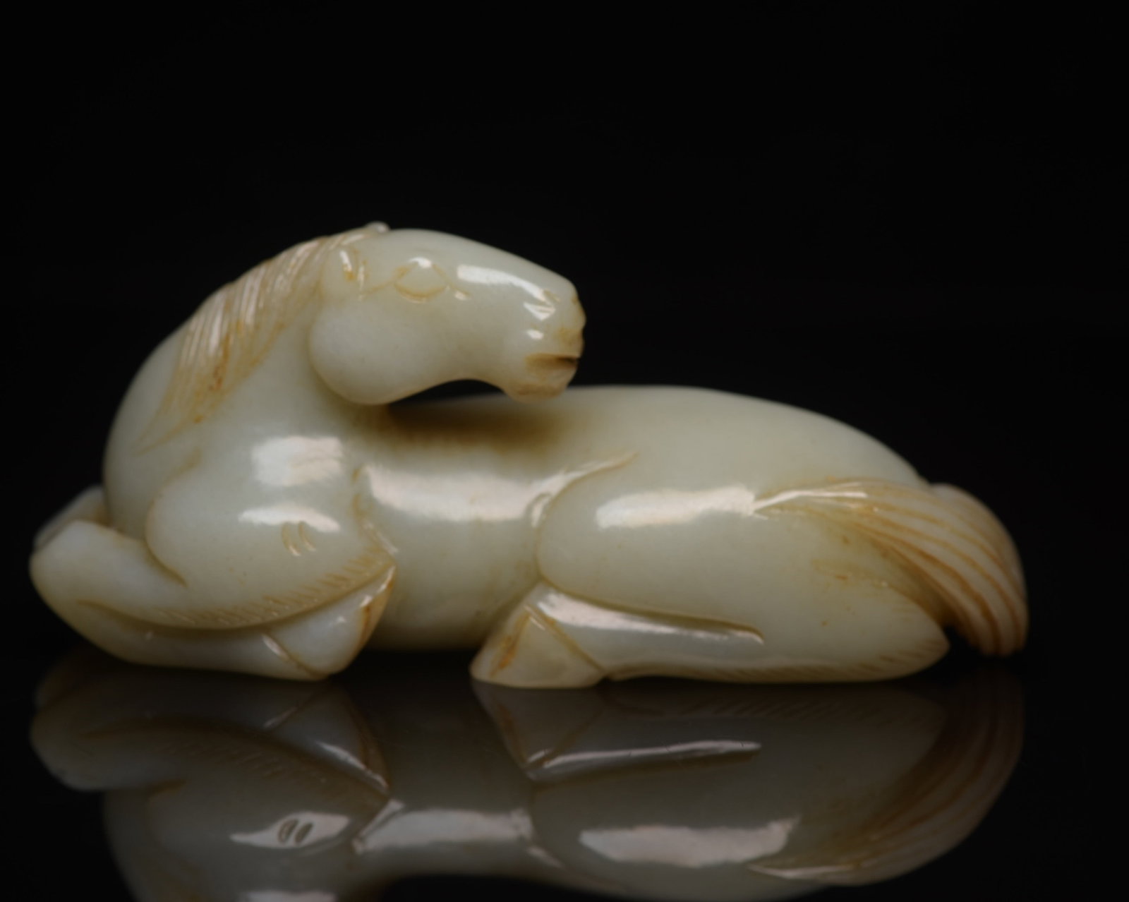 An Exquisite White Jade Horse Ornament: An Exquisite White Jade Horse Ornament,Qing Dynasty,China,Size:3.9inx1.7inx1.4in,Weight:176g 白玉骏马摆件,中国清代