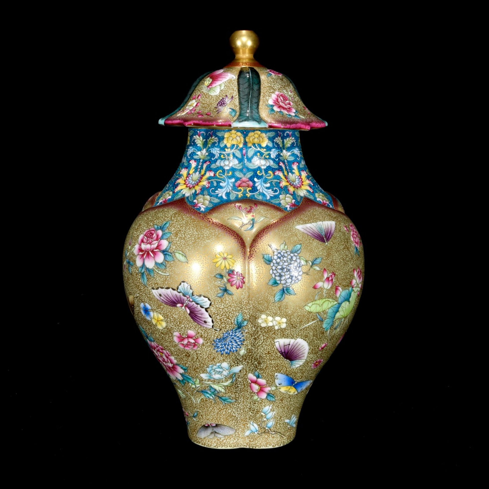 An Exquisite Enamel Flower and Butterfly Pattern Jar with Cover: An Exquisite Enamel Flower and Butterfly Pattern Jar with Cover,Qing Dynasty,China,Qianlong Four-Character Mark,Size:10.2inx5.9in 珐琅彩花卉蝴蝶纹௢