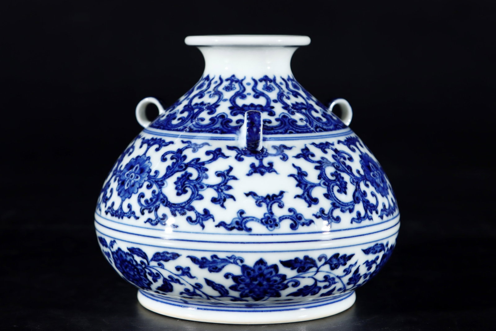 An Exquisite Blue and White Lotus Pattern Vase: An Exquisite Blue and White Lotus Pattern Vase,Qing Dynasty,China,Qianlong Six-character Mark,Size:4.7inx5.5in