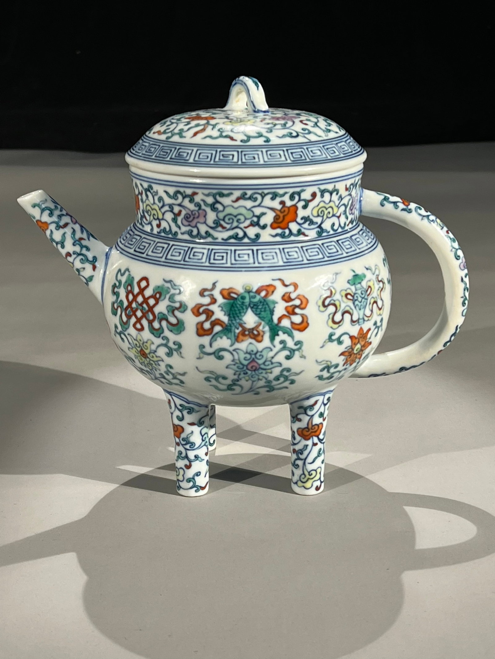 An Exquisite Blue and White Doucai Eight Treasures Pattern Pot: An Exquisite Blue and White Doucai Eight Treasures Pattern Pot,Qing Dynasty,China,Qianlong Six-character Mark,Size:8.7in 青花斗彩八宝纹壶,中ࢲ