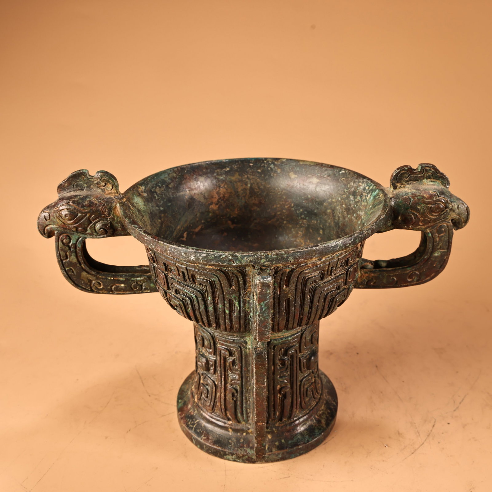 An Archaic Bronze Beast-Face Pattern Libation Cup - 2