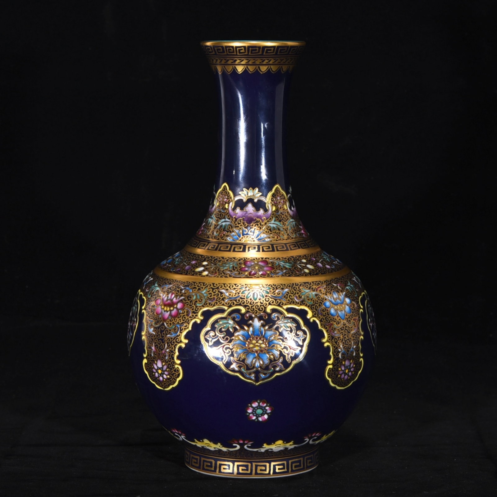 An Exquisite Ji Blue Glazed Enamel Gilt Flower Pattern Vase: An Exquisite Ji Blue Glazed Enamel Gilt Flower Pattern Vase,Qing Dynasty,China,Qianlong Six-character Mark,Size:9.4inx5.5in 霁蓝釉珐琅彩鎏金花