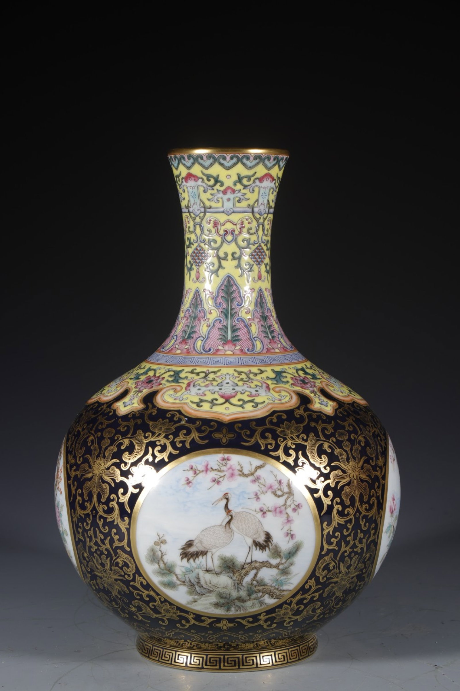 An Exquisite Yellow Ground Ji Blue Glazed Flower and Bird Pattern Vase: An Exquisite Yellow Ground Ji Blue Glazed Flower and Bird Pattern Vase,Qing Dynasty,China,Qianlong Four-character Mark,Size:13.2inx4.7in 黄地霁蓝釉花鸟纹