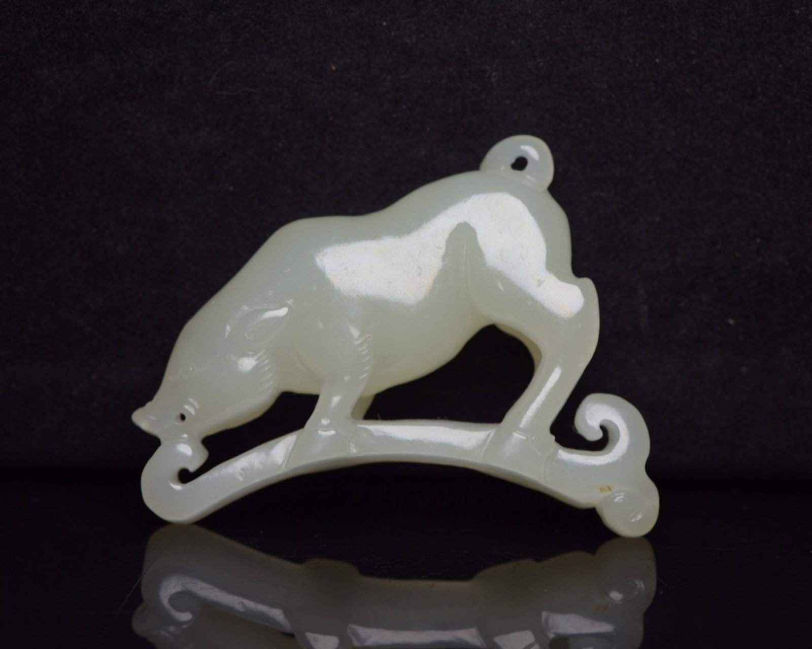 An Exquisite White Jade Pig Ornament: An Exquisite White Jade Pig Ornament,Qing Dynasty,China,Size:2.4inx1.8inx0.5in,Weight:40g 白玉猪摆件,中国清代