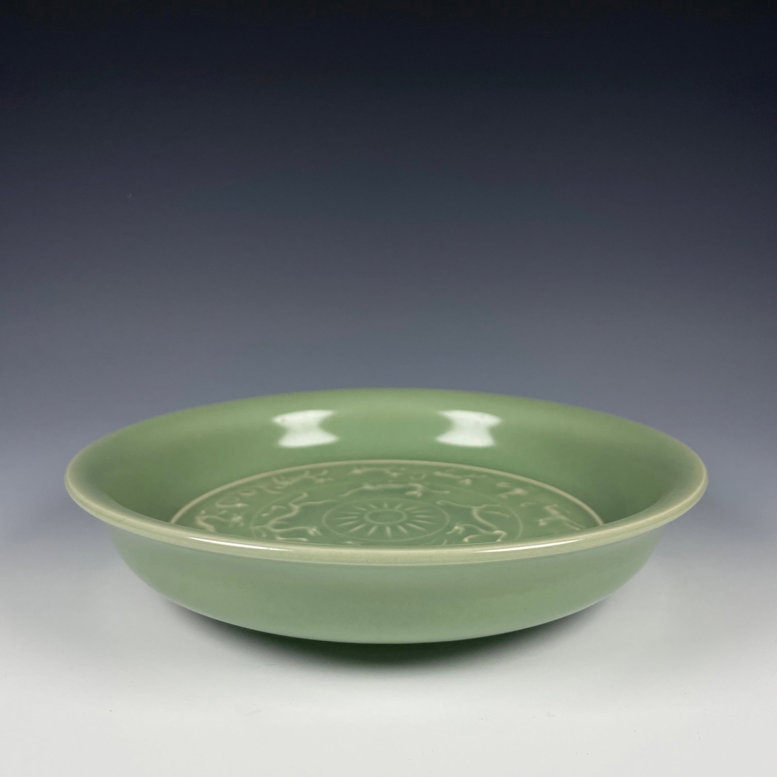 An Exquisite Longquan yao the Twelve Chinese Zodiac Signs Pattern Plate: An Exquisite Longquan yao the Twelve Chinese Zodiac Signs Pattern Plate,Song Dynasty,China,Size:1.6inx8.3in 龙泉窑十二生肖纹盘子,中