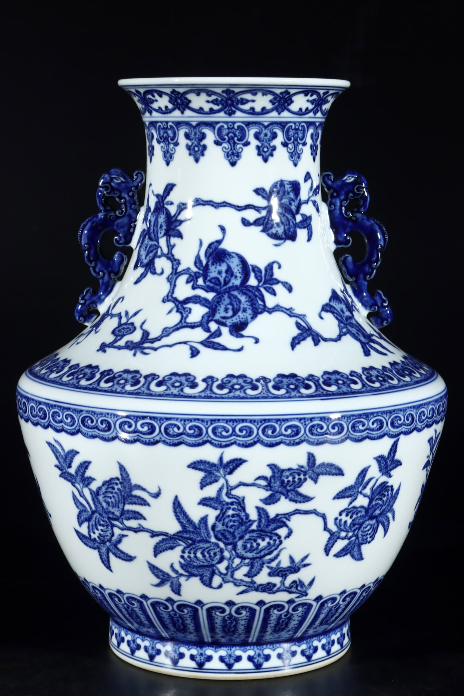 A Rare Blue and White Flower and Fruit Pattern Double-Ears Vase: A Rare Blue and White Flower and Fruit Pattern Double-Ears Vase,Qing Dynasty,China,Qianlong Six-character Mark,Size:13.8inx10.2in 青花花果纹双耳瓶,È