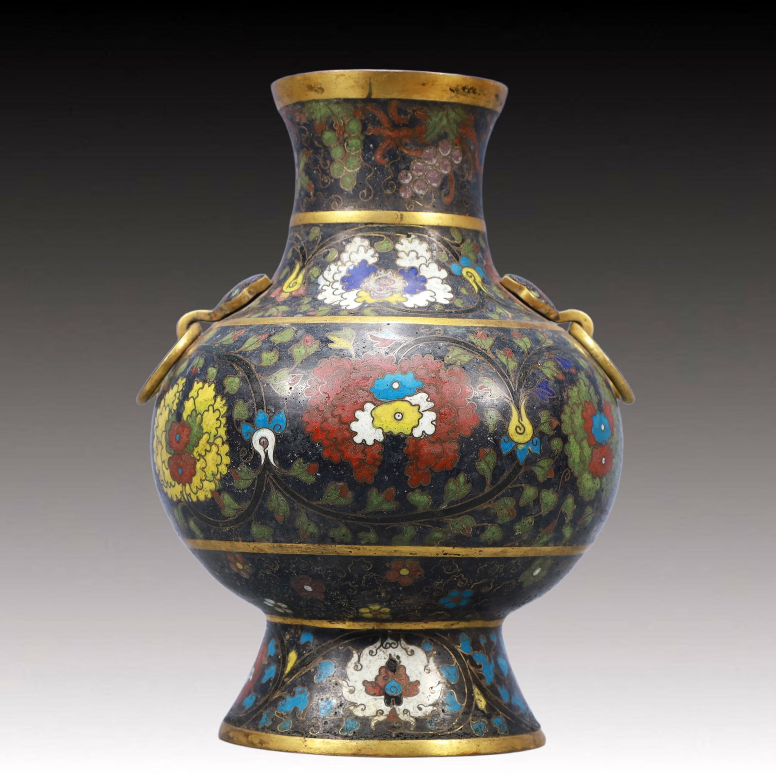 An Exquisite Cloisonne Flower Pattern Double-Ears Vase: An Exquisite Cloisonne Flower Pattern Double-Ears Vase,Ming Dynasty, China,Jing Tai Four-character Mark,Size:11inx7.9inWeight:2300g 景泰蓝花卉纹双耳