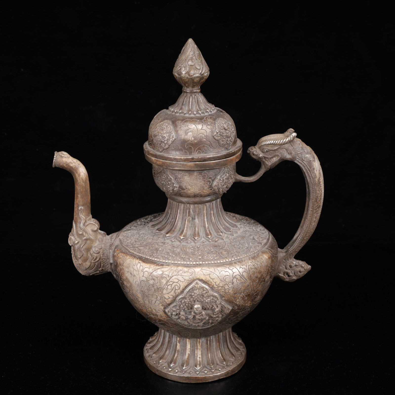 An Exquisite Silver-Plated Bronze Lotus Pattern Ewer: An Exquisite Silver-Plated Bronze Lotus Pattern Ewer,Qing Dynasty,China,Size:11.4inx6.7inx13.4in,Weight:2600g 铜镀银缠枝莲纹执壶,中国&