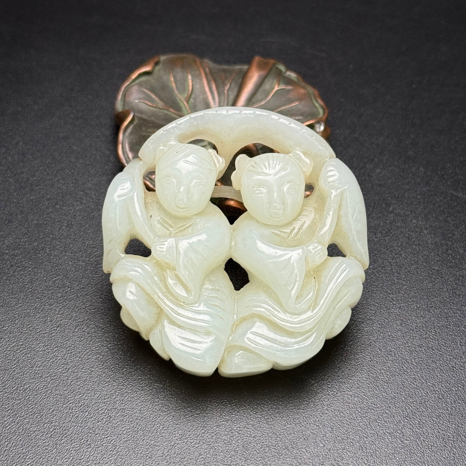 An Exquisite White Jade Figure Pendant: An Exquisite White Jade Figure Pendant,Qing Dynasty,China,Size:51mmx52mmx14mm,Weight:55g 白玉人物佩,中国清代