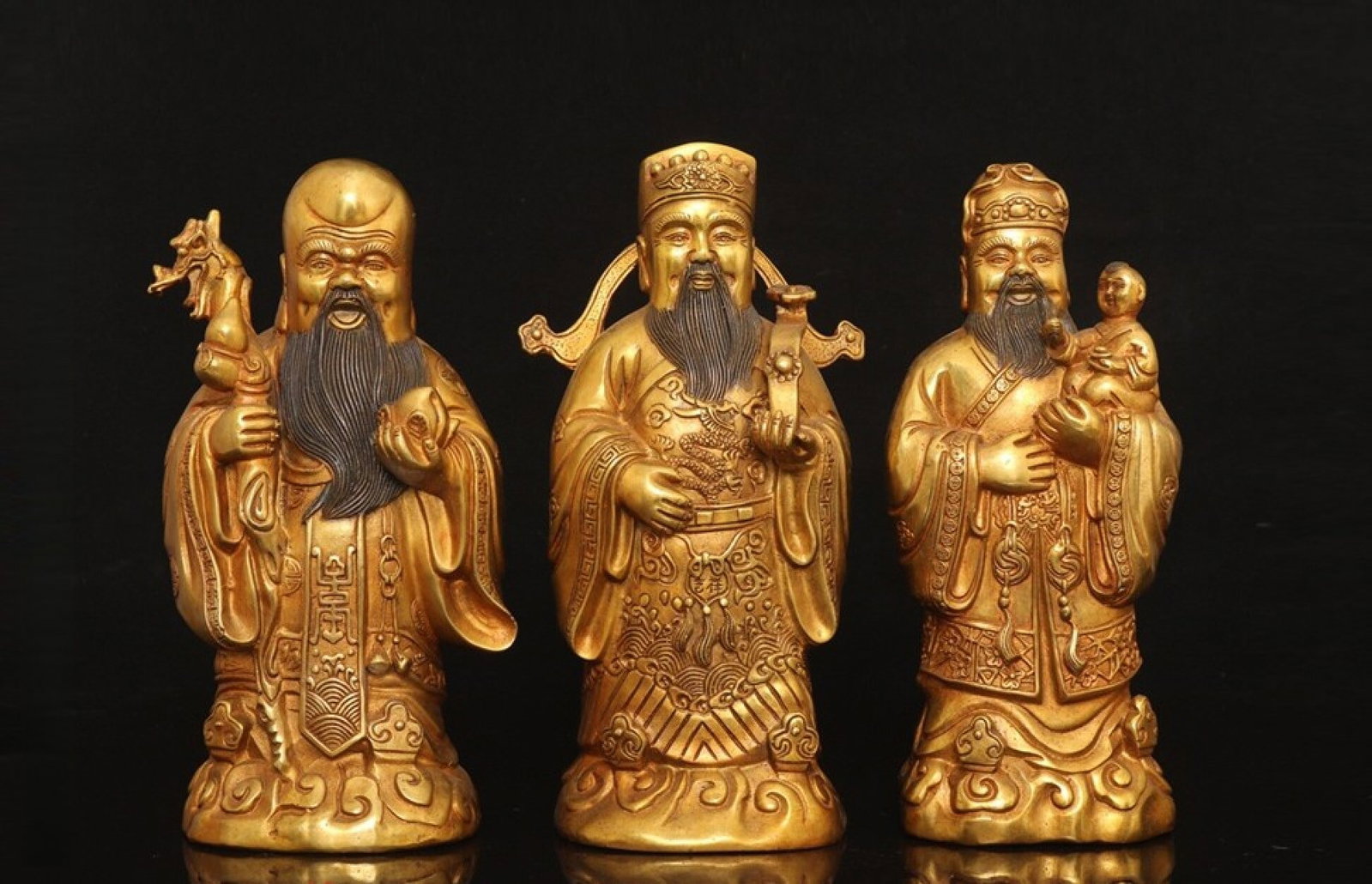A Set of Solemn Gilt Bronze Figure Ornaments: A Set of Solemn Gilt Bronze Figure Ornaments,Qing Dynasty,China,Qianlong Four-Character Mark,Size:9.1inx3.9in,Weight:4.25kg 一套铜鎏金人物摆件,