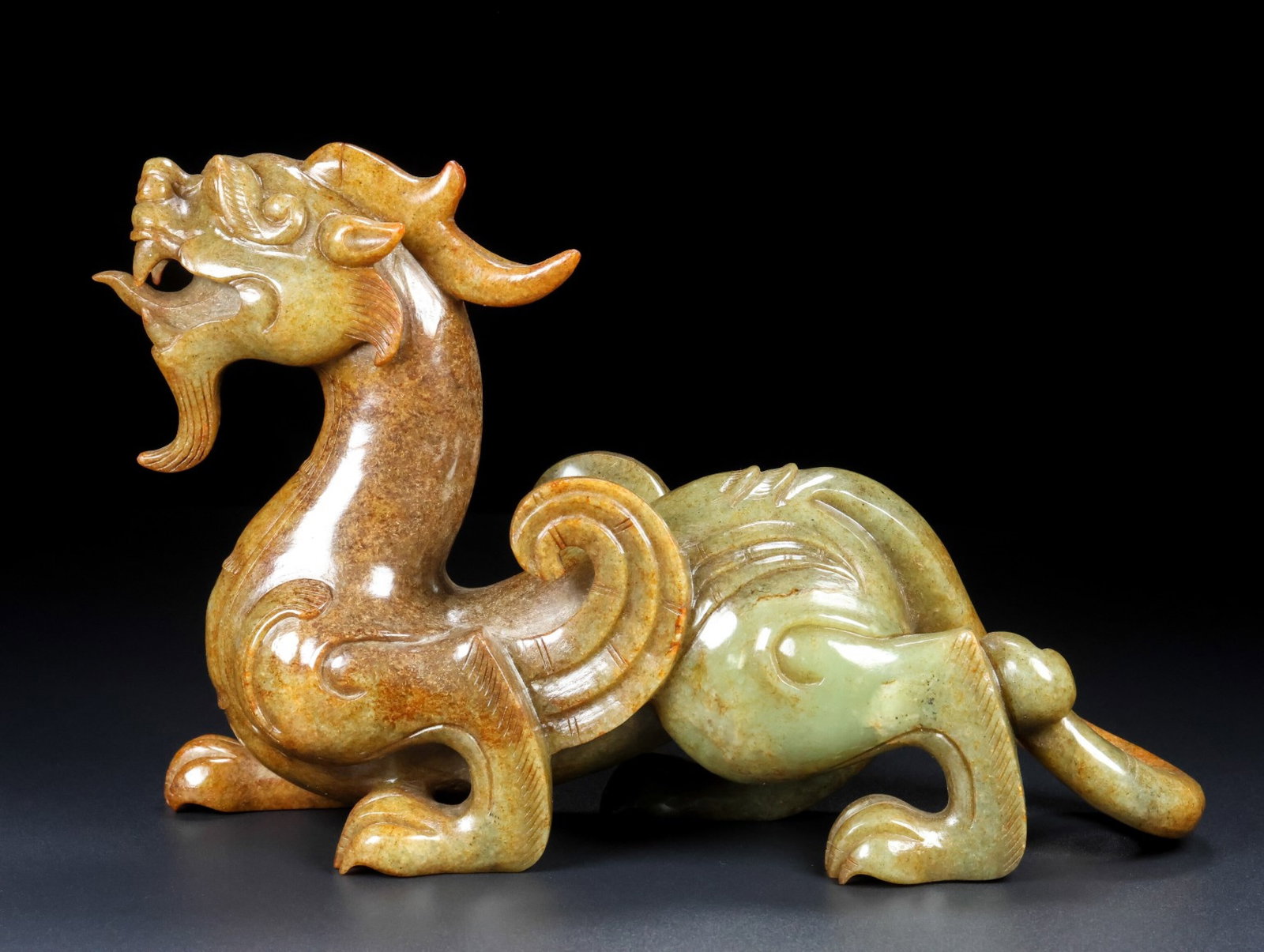 An Exquisite Archaic Jade Auspicious Beast Ornament: An Exquisite Archaic Jade Auspicious Beast Ornament,Ancient Time,China,Size:10.2inx6.3inx3.1in,Weight:1805g 高古玉瑞兽摆件,中国远古