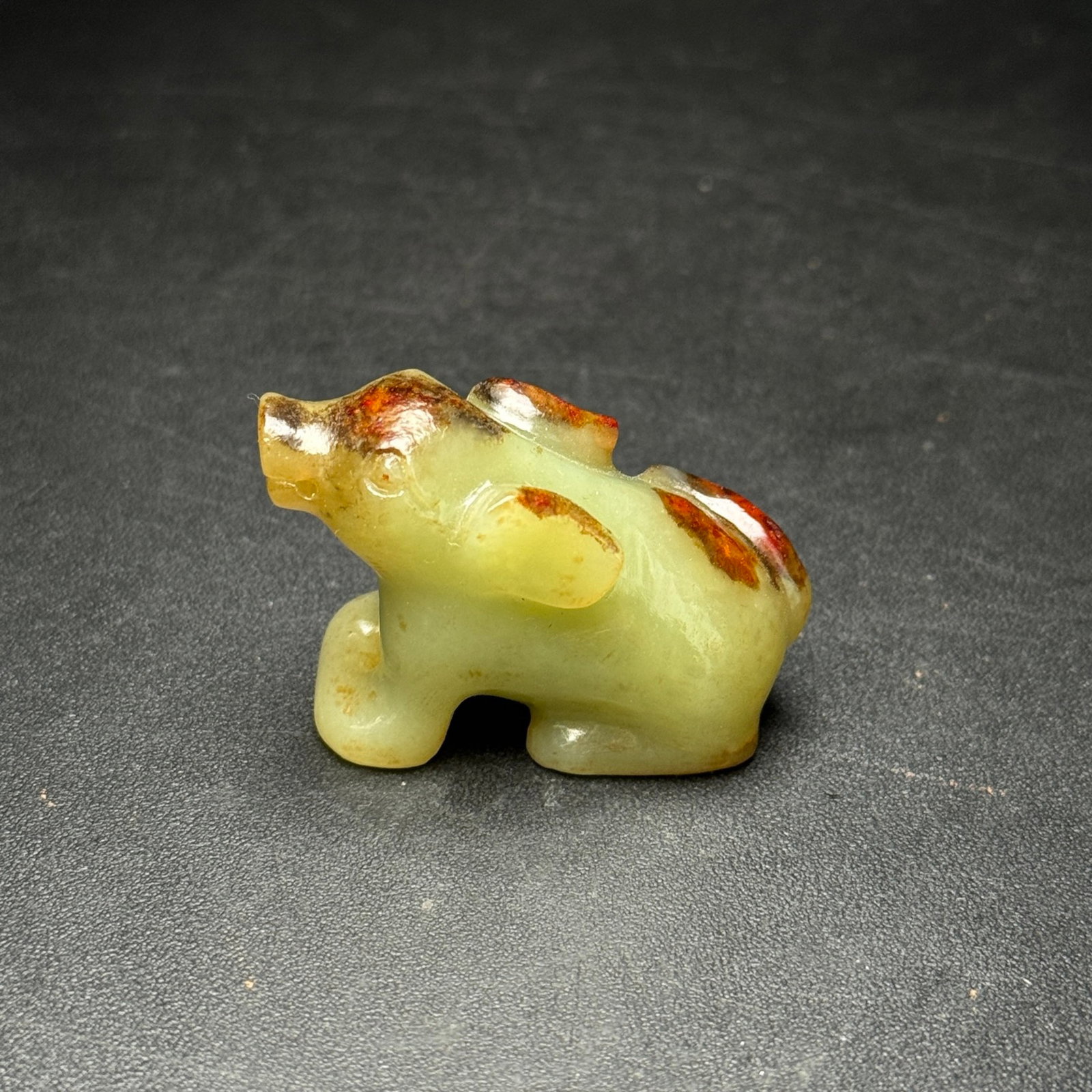 An Exquisite Yellow Jade Auspicious Beast Ornament: An Exquisite Yellow Jade Auspicious Beast Ornament,Ancient Time,China,Size:44mmx27mmx19mm,Weight:30g 黄玉瑞兽摆件,中国远古时期