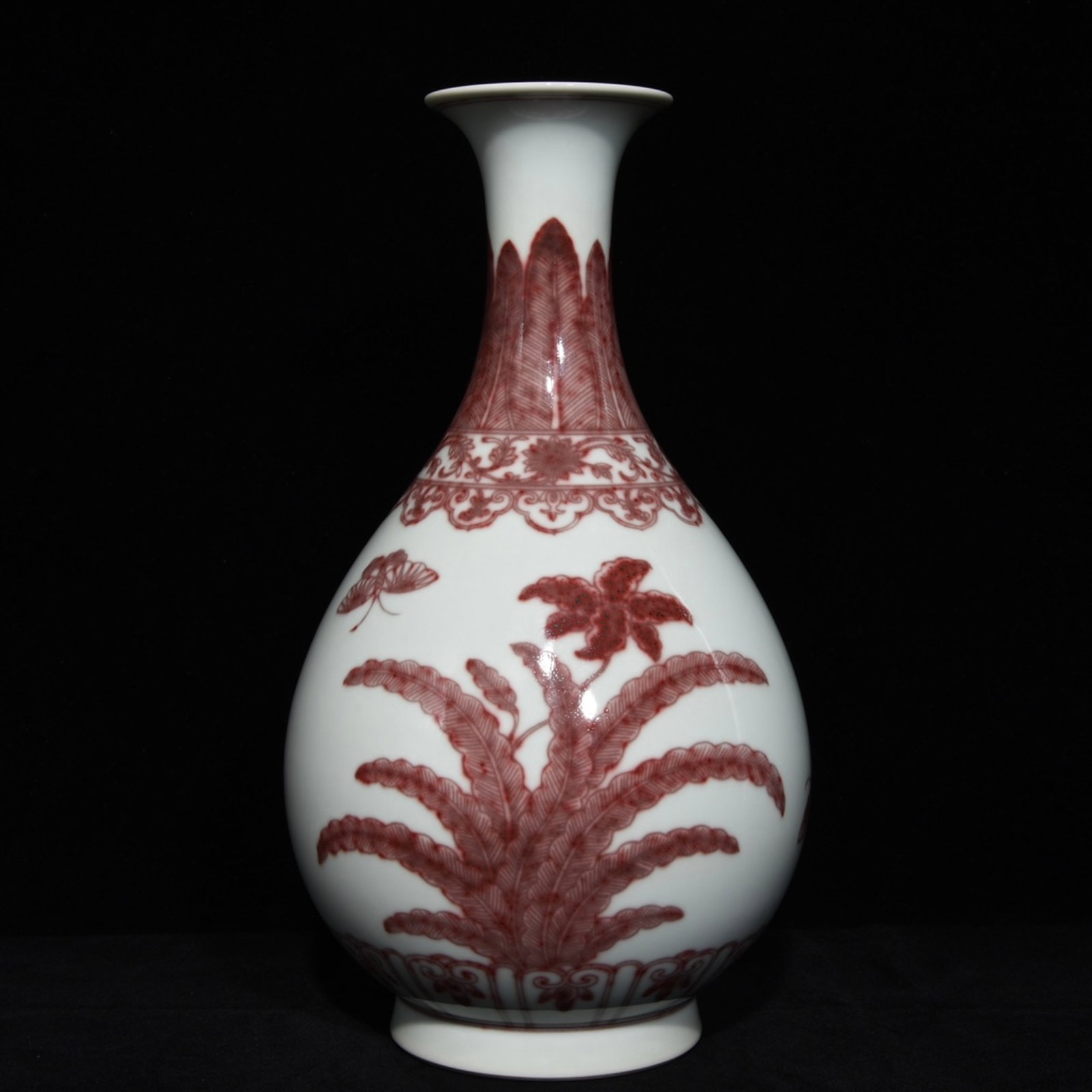 A Rare Underglaze-Red Flower and Butterfly Pattern Vase: A Rare Underglaze-Red Flower and Butterfly Pattern Vase,Qing Dynasty,China,Qianlong Six-character Mark,Size:13.6inx7.5in 釉里红花卉蝴蝶纹瓶,ߑ