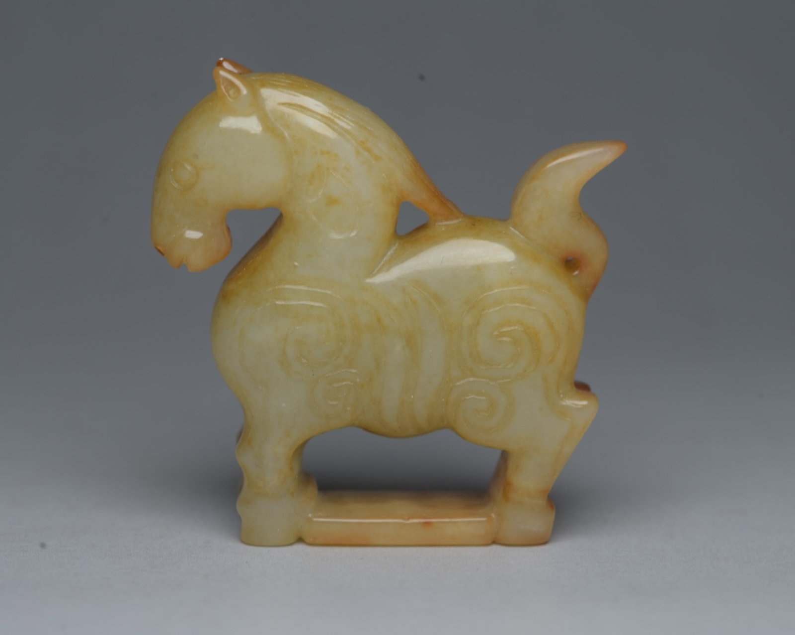 An Exquisite White Jade Horse Ornament: An Exquisite White Jade Horse Ornament,Qing Dynasty,China,Size:1.9inx1.9inx0.5in,Weight:45g 白玉骏马摆件,中国清代