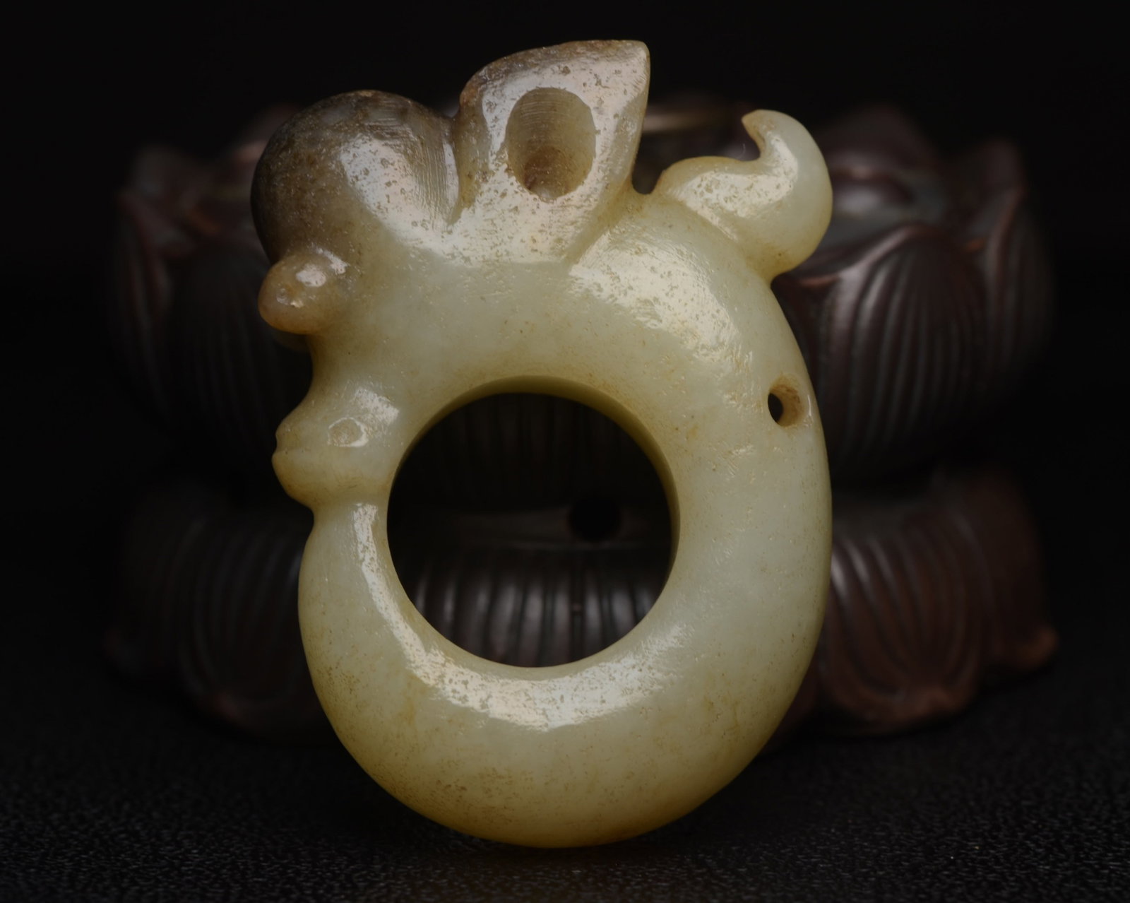 An Exquisite White Jade Pig and Dragon Pendant: An Exquisite White Jade Pig and Dragon Pendant,Qing Dynasty,China,Size:2.4inx1.8inx0.7in,Weight:67g 白玉猪龙挂件,中国清代