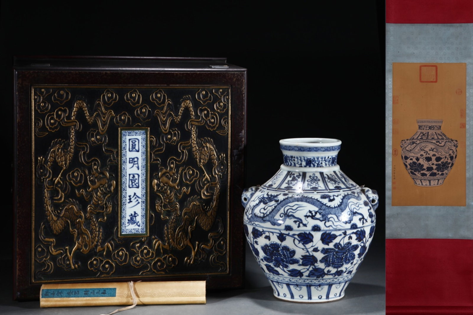 A Rare Blue and White Flower and Dragon Pattern Beast-Ears Jar,with Chinese Vertical Scroll Ink: A Rare Blue and White Flower and Dragon Pattern Beast-Ears Jar,with Chinese Vertical Scroll Ink Painting on Silk,Yuan Dynasty,China,Size:(Without Frame)24.4inx12.6in,(Porcelain)15.2inx13in 青