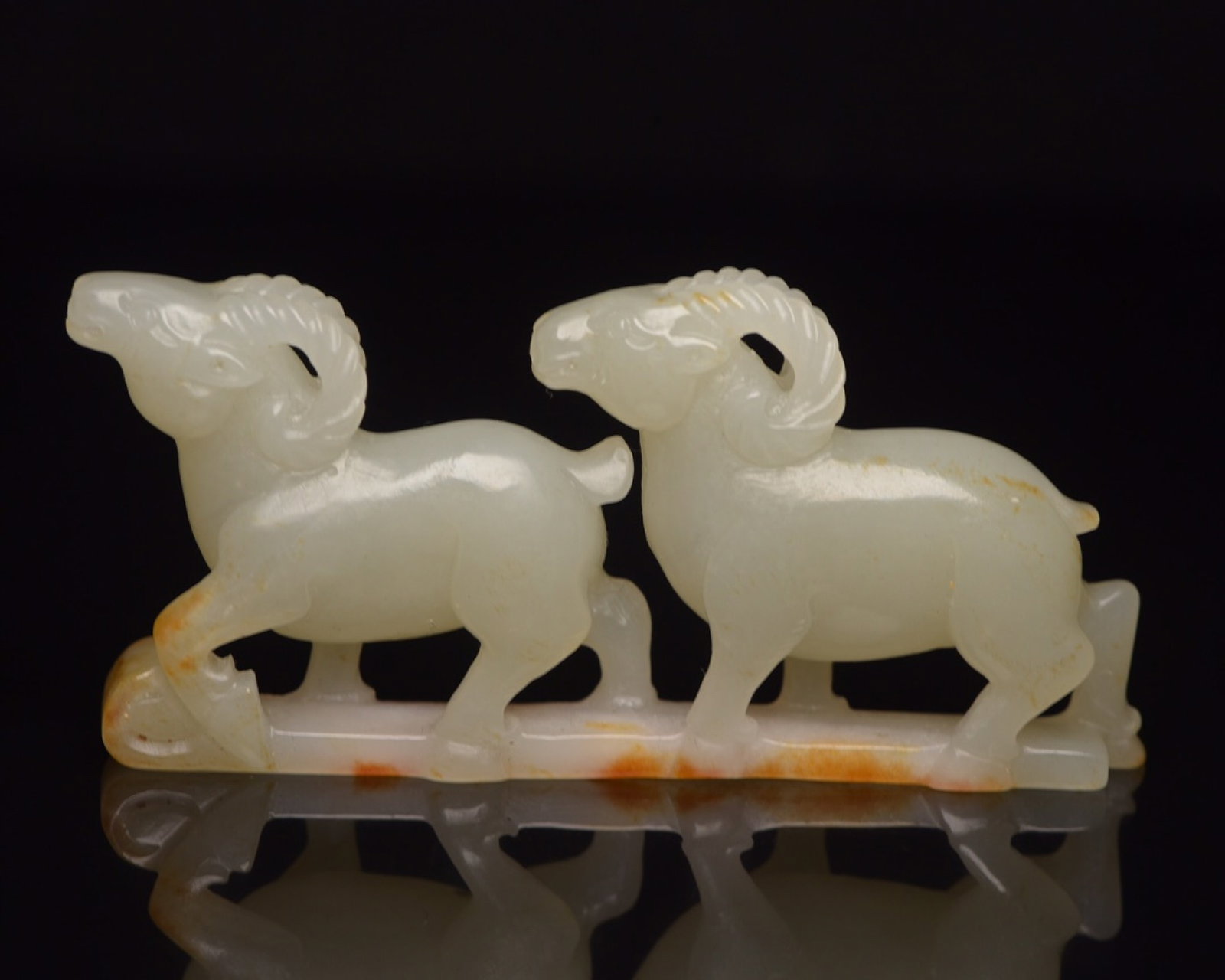 An Exquisite White Jade Sheep Ornament: An Exquisite White Jade Sheep Ornament,Qing Dynasty,China,Size:3.3inx1.4inx0.5in,Weight:50g 白玉羊摆件,中国清代