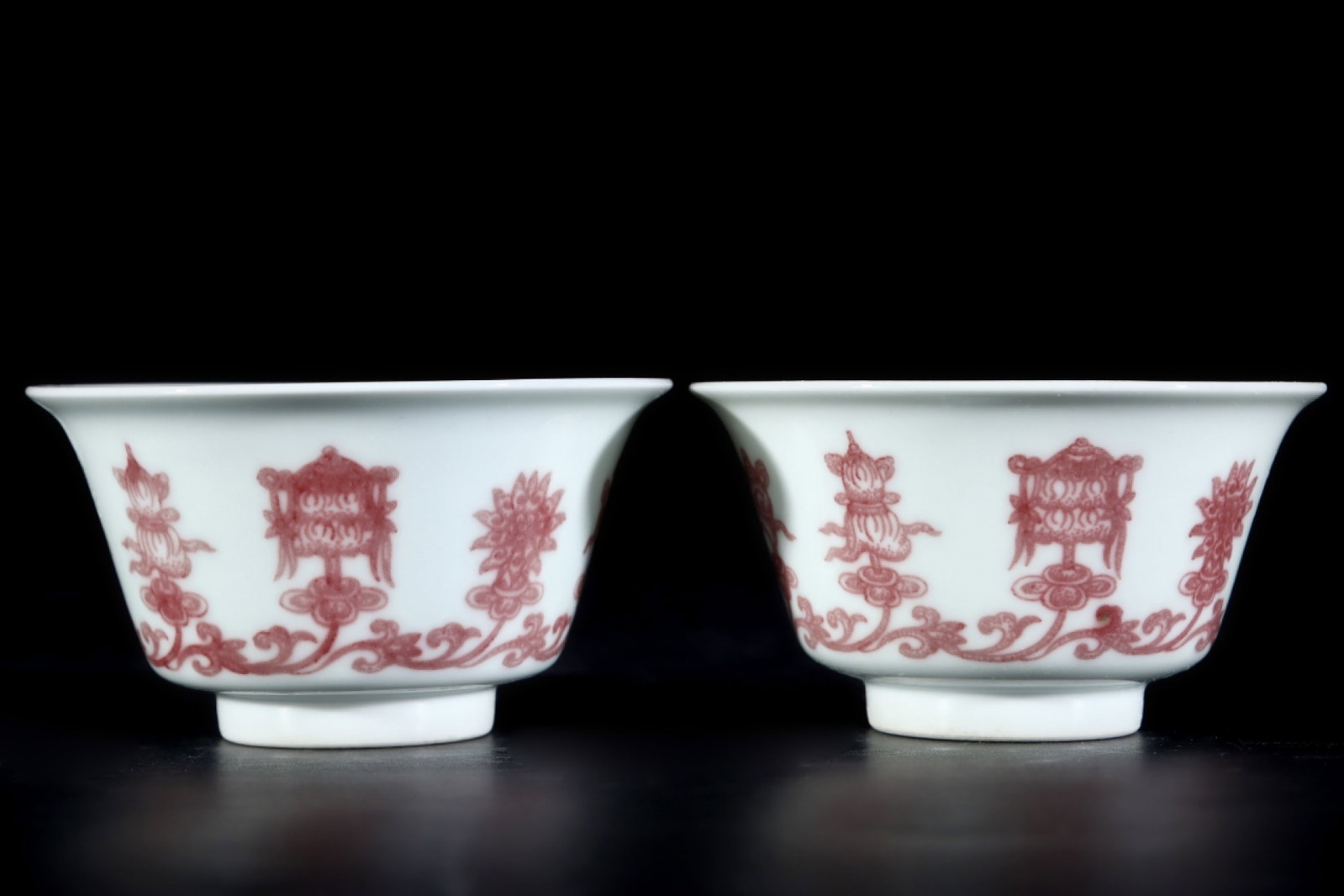 A Pair of Exquisite Underglaze-Red Eight Treasures Pattern Cups: A Pair of Exquisite Underglaze-Red Eight Treasures Pattern Cups,Qing Dynasty,China,Yongzheng Six-character Mark,Size:1.9inx3.3in 一对釉里红八宝纹杯