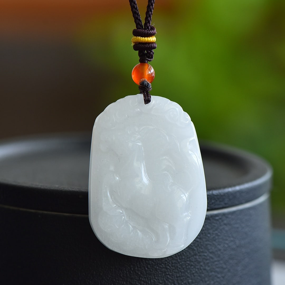 An Exquisite White Jade Horse Pattern Pendant: An Exquisite White Jade Horse Pattern Pendant,Size:43mmx32mm 白玉马纹挂件