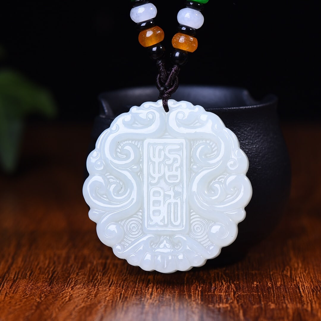 An Exquisite White Jade Pendant: An Exquisite White Jade Pendant,Size:47mmx47mm 白玉挂件