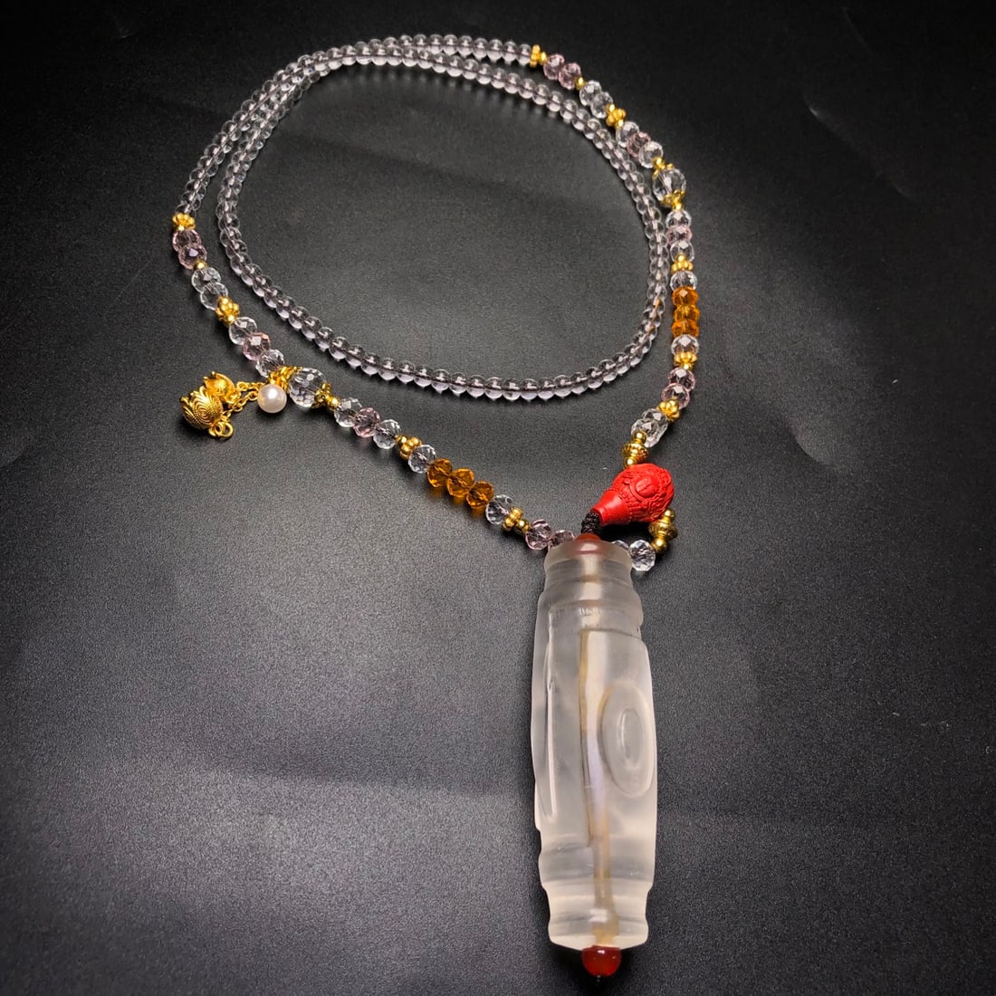 A Precious Dzi Bead Necklace: A Precious Dzi Bead Necklace,Size:70mmx21mm,Weight:71g 天珠项链