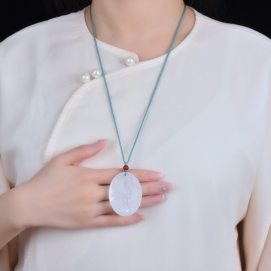 An Exquisite White Jade Fish Pattern Pendant: An Exquisite White Jade Fish Pattern Pendant,Size:39mmx51mm 白玉鱼纹挂件