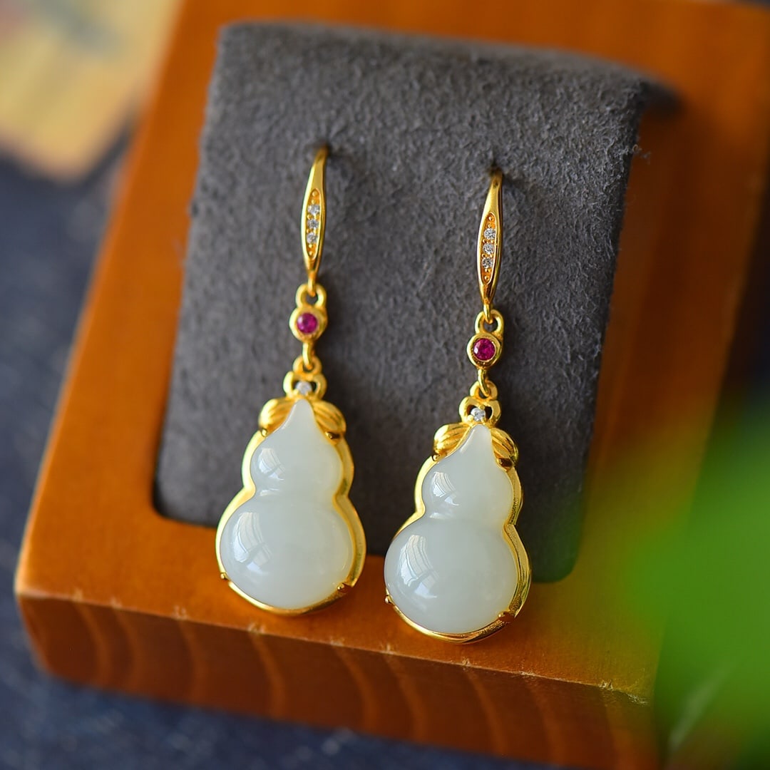 A Pair of Exquisite Sterling Silver-Gold Plated Inlaid White Jade Earrings: A Pair of Exquisite Sterling Silver-Gold Plated Inlaid White Jade Earrings,Size:12mmx39mm 一对纯银镀金镶白玉耳环