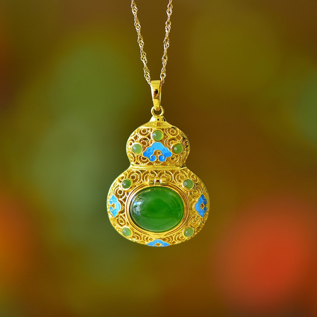 An Exquisite Sterling Silver-Gold Plated Inlaid Jasper Gourd Pendant: An Exquisite Sterling Silver-Gold Plated Inlaid Jasper Gourd Pendant,Size:10mmx12mm 纯银镀金镶碧玉葫芦吊坠