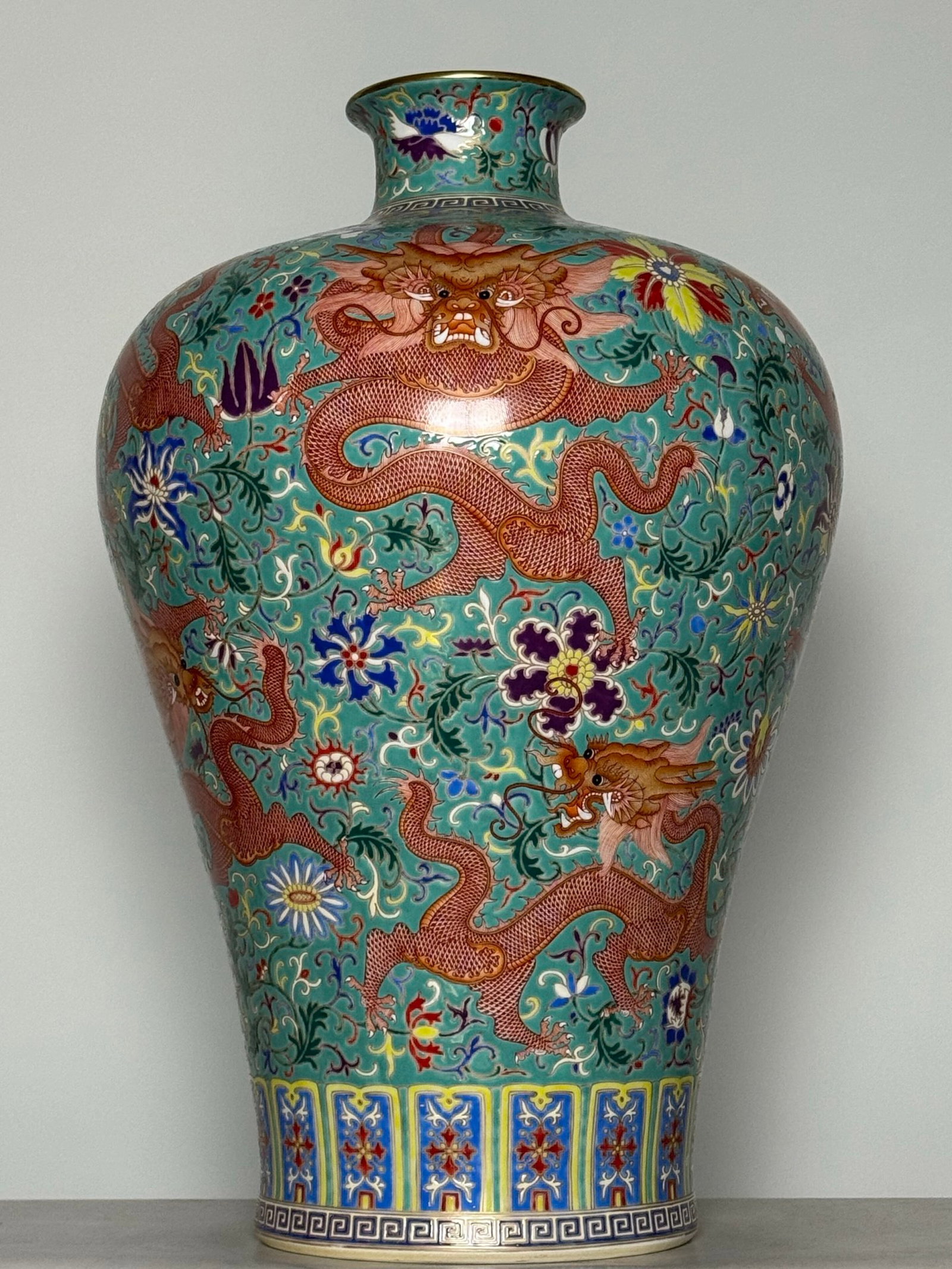 A Huge Enamel Iron-Red Lotus and Dragon Pattern Vase: A Huge Enamel Iron-Red Lotus and Dragon Pattern Vase,Qing Dynasty,China,Qianlong Six-character Mark,Size:22.4inx15in 珐琅彩矾红缠枝莲龙纹