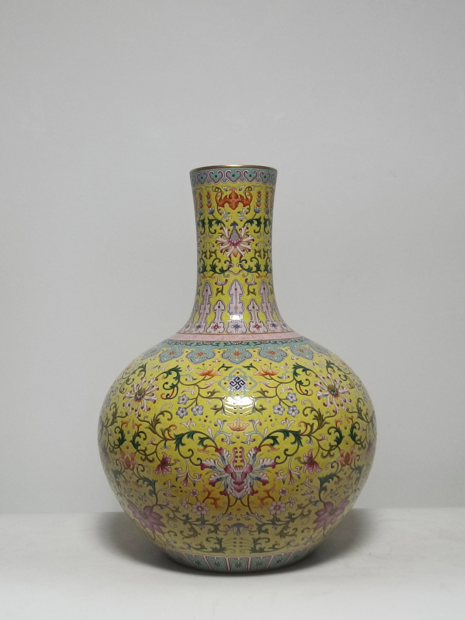 A Huge Yellow Ground Famille-Rose Lotus Pattern Vase: A Huge Yellow Ground Famille-Rose Lotus Pattern Vase,Qing Dynasty,China,Qianlong Six-character Mark,Size:22.8inx16.5in 黄地粉彩缠枝莲纹瓶,中