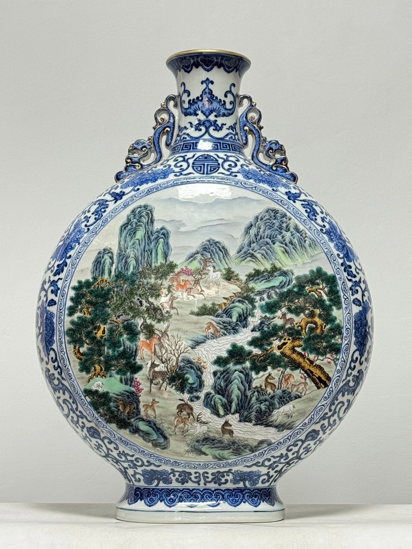 A Huge Blue and White Famille-Rose Pine and Deer Pattern Double-Ears Vase: A Huge Blue and White Famille-Rose Pine and Deer Pattern Double-Ears Vase,Qing Dynasty,China,Qianlong Six-character Mark,Size:22.8inx16.1in