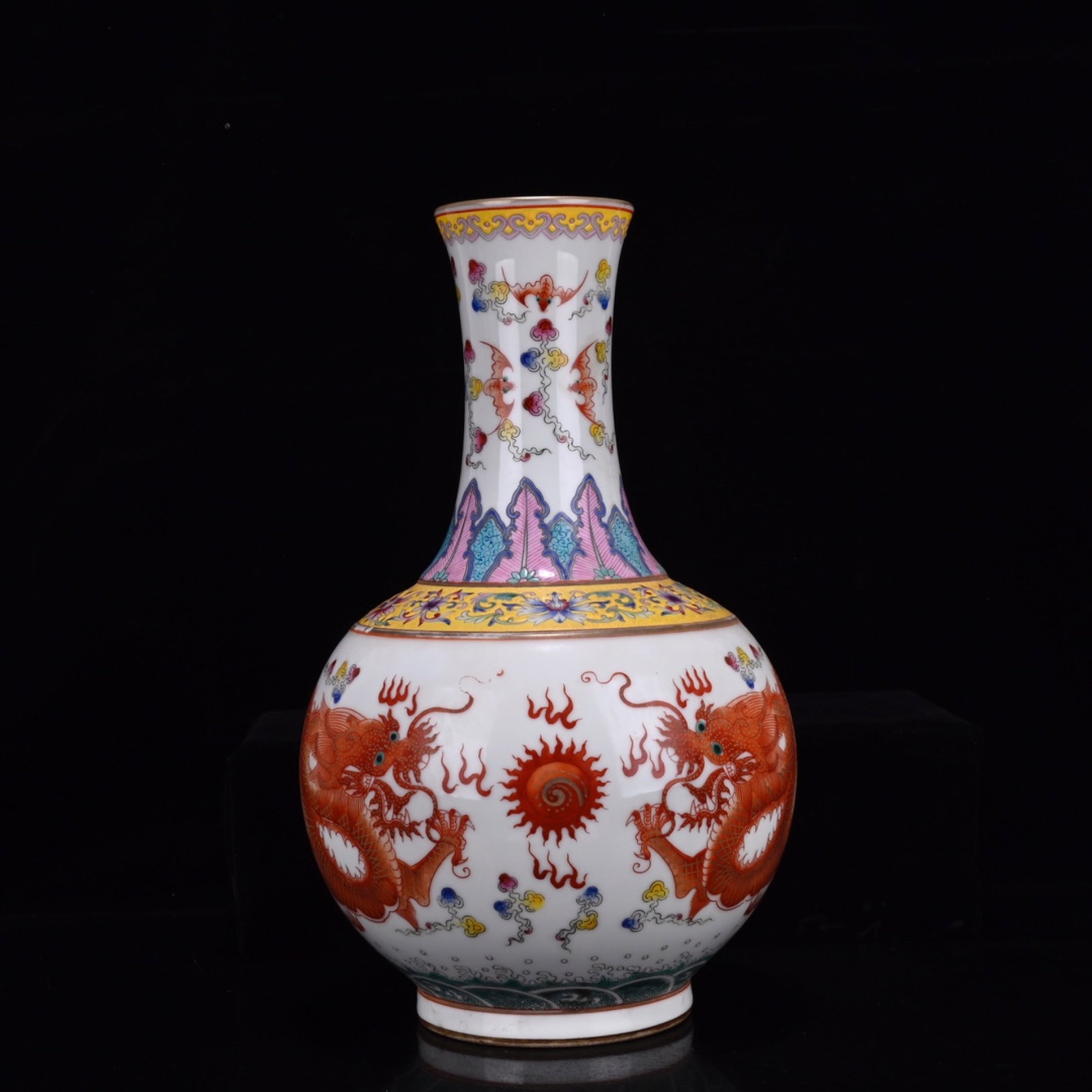 An Exquisite Enamel Iron-Red Auspicious Cloud and Dragon Pattern Vase: An Exquisite Enamel Iron-Red Auspicious Cloud and Dragon Pattern Vase,Qing Dynasty,China,Qianlong Six-character Mark,Size:13.4inx7.9in 珐琅彩矾红祥云龙&