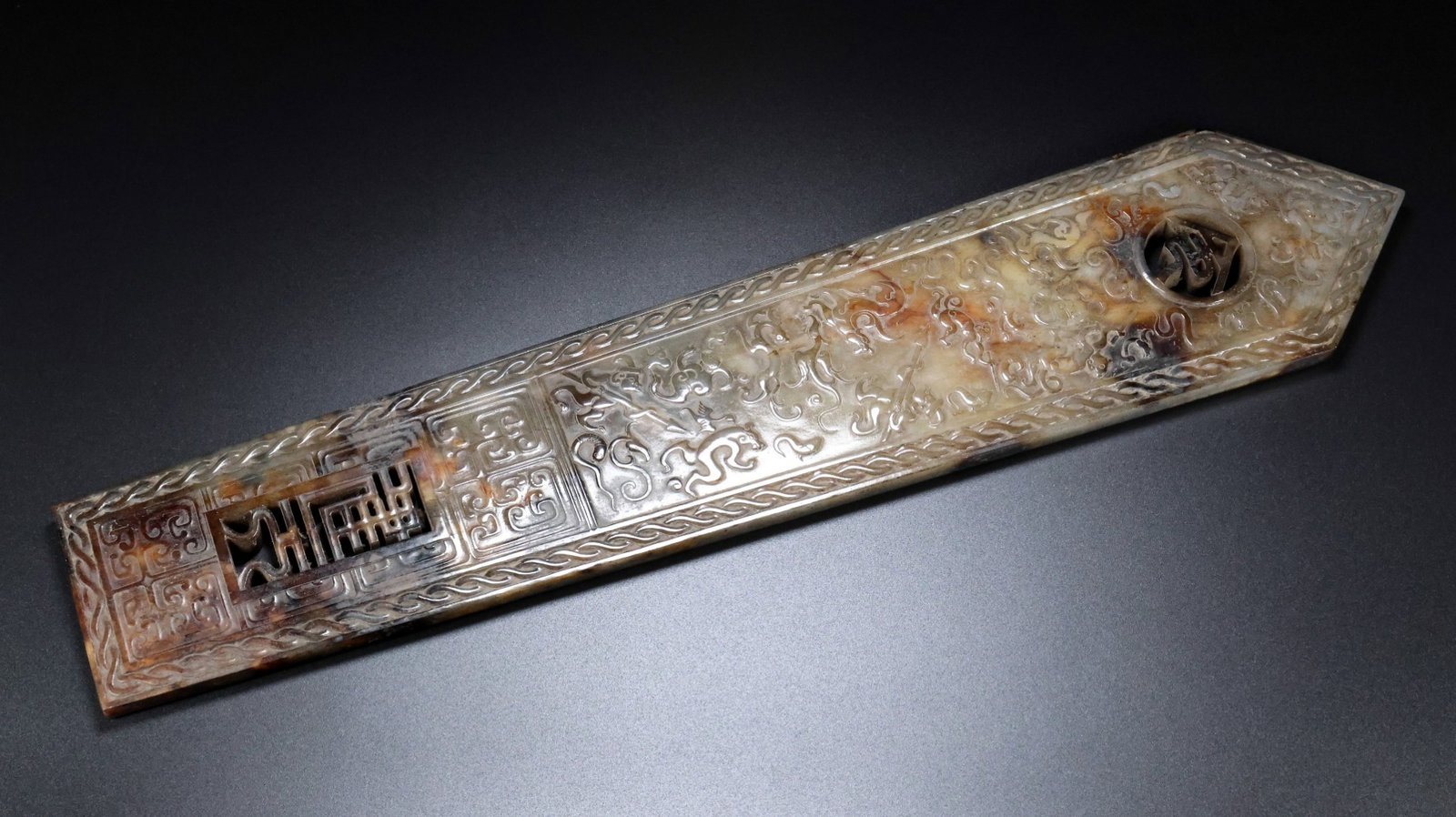 An Archaic Gaogu yu Ornament: An Archaic Gaogu yu Ornament,Ancient Time, China, Size:3.1inx0.4inx17.7in, Weight:857g 高古玉摆件,中国远古时期,