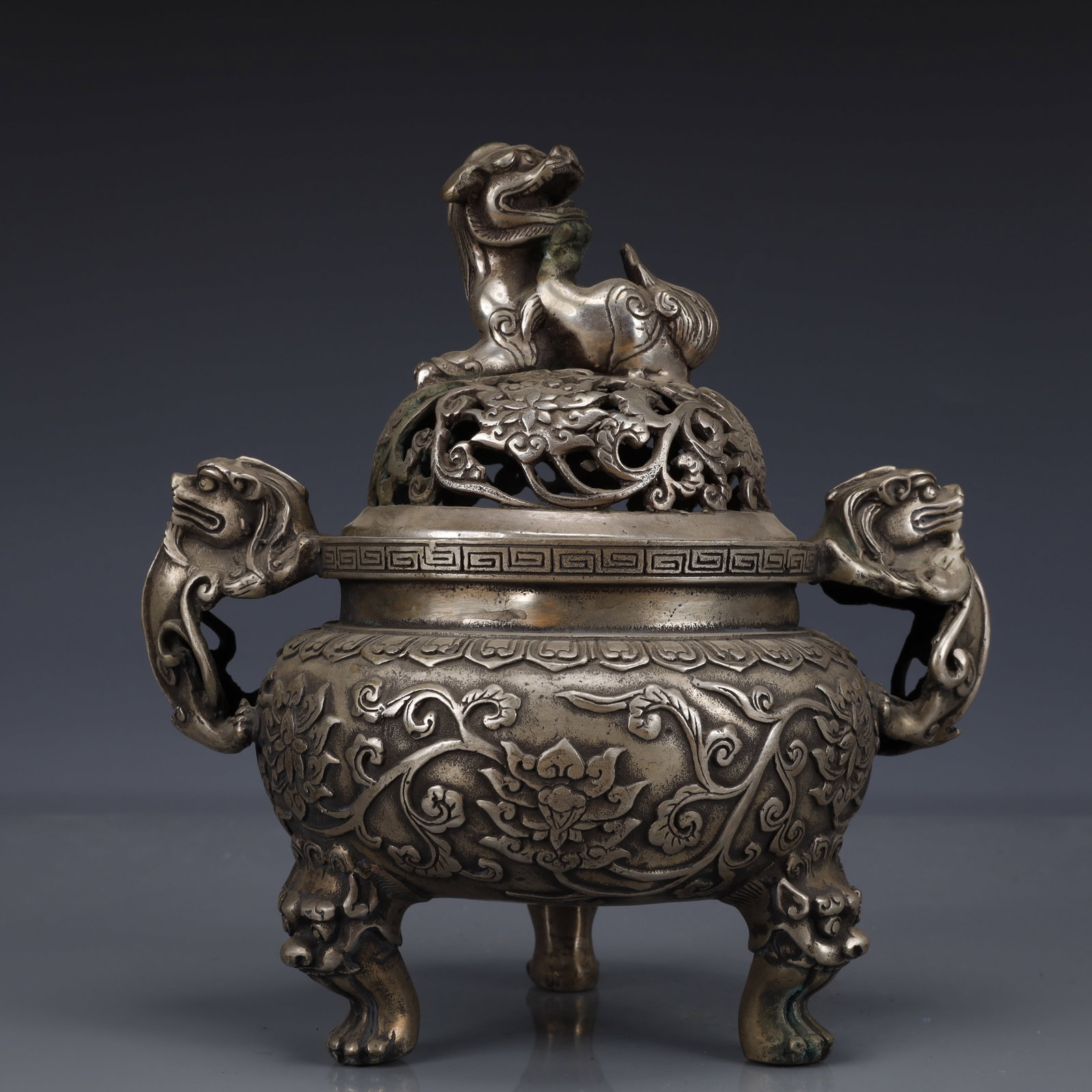 An Exquisite Silver-Plated Bronze Lotus Pattern Double-Ears and Tripod Censer: An Exquisite Silver-Plated Bronze Lotus Pattern Double-Ears and Tripod Censer,Qing Dynasty, China,Qianlong Four-character Mark,Size:7.1inx5.5inx7.9in,Weight:1250g