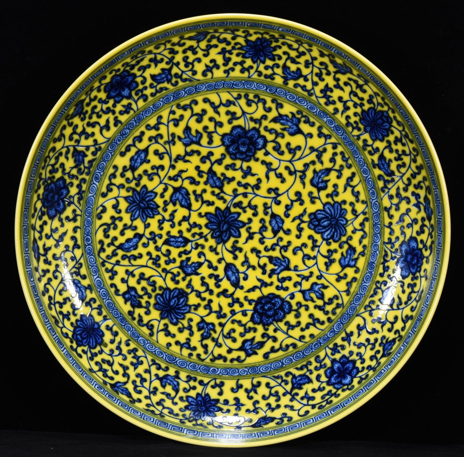 An Exquisite Yellow Glazed Blue and White Lotus Pattern Plate: An Exquisite Yellow Glazed Blue and White Lotus Pattern Plate,Qing Dynasty,China,Yongzheng Six-Character Mark,Size:2inx11.8in 黄釉青花缠枝莲纹盘,&
